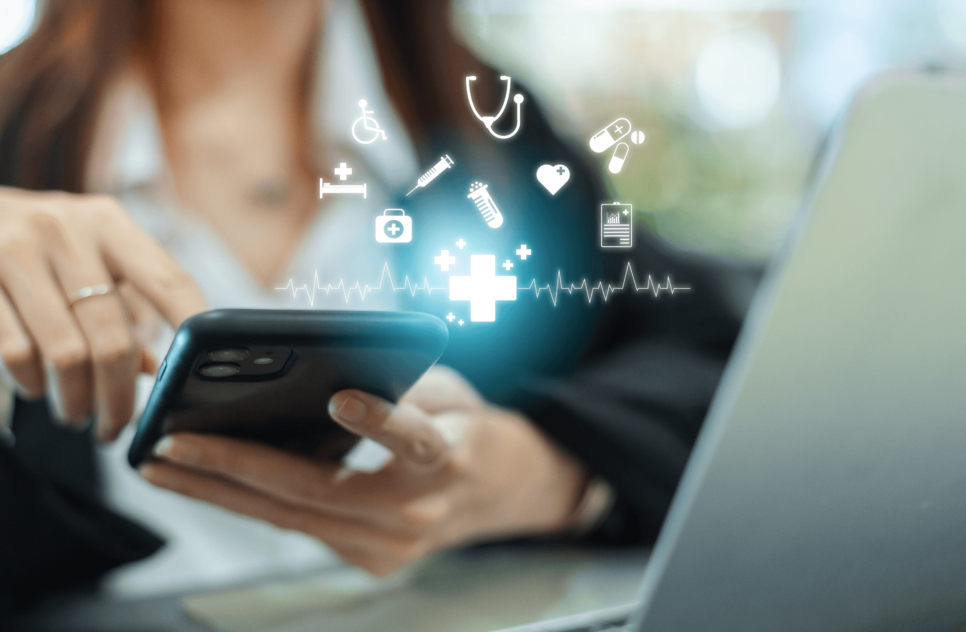 Healthcare_IT_Telehealth Healthcare provider reviewing remote patient monitoring data on a mobile health platform integrated with an EHR system